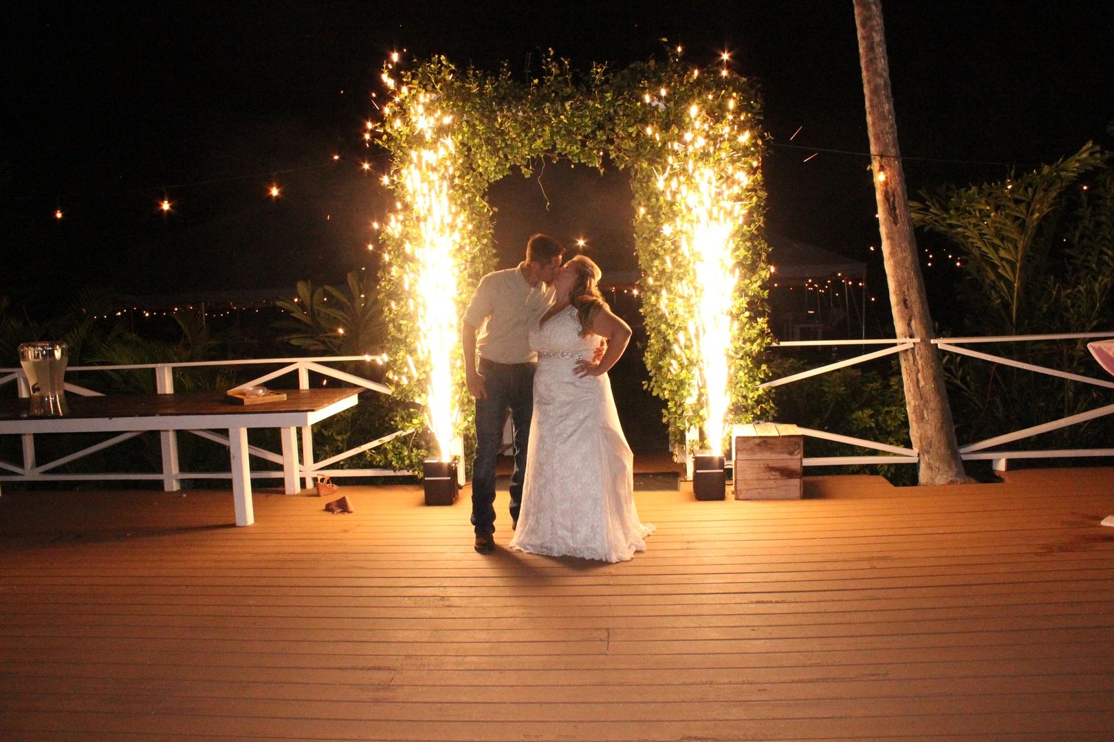 Indoor sparklers lighting up the dance floor at a reception