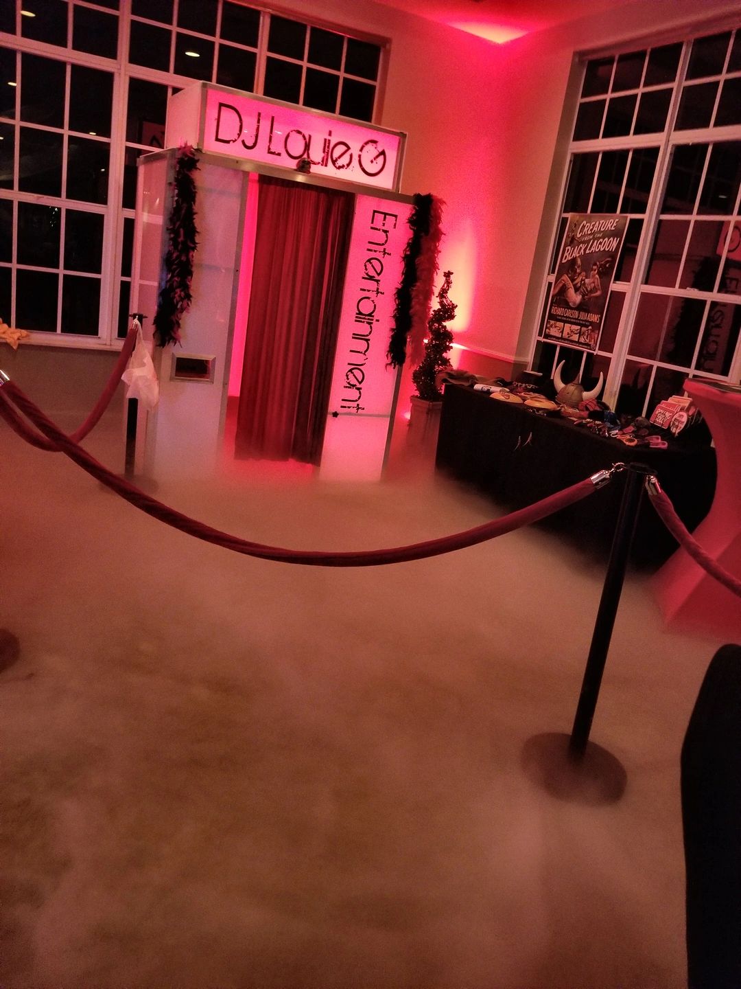 Enclosed photo booth with attendants at a Port St. Lucie event